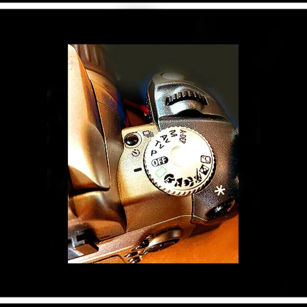 Canon Rebel EOS T2 Photography Camera With An Original Canon Camera Strap